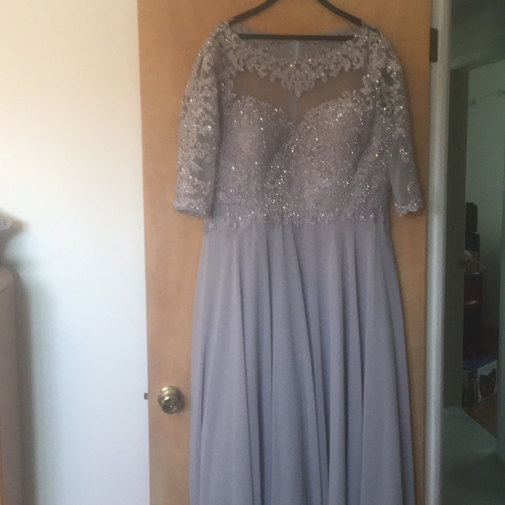 Very elegant size 18 Silver floor length dress